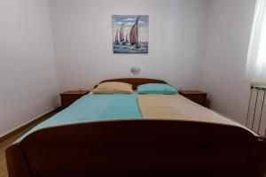 Posteľ alebo postele v izbe v ubytovaní Apartman Boris