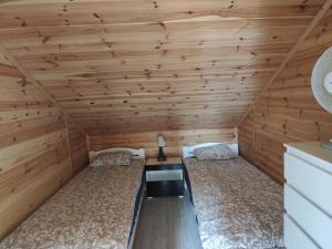 Postel nebo postele na pokoji v ubytování Relax u Agi i Jurka