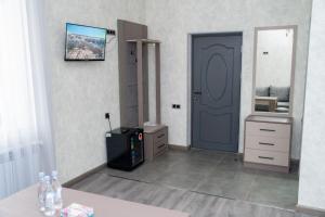 Kuchyň nebo kuchyňský kout v ubytování Max Hotel