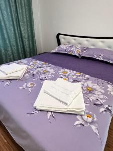 En eller flere senge i et værelse på Casa Cristian