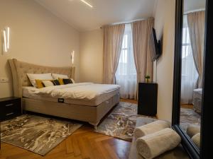 Postel nebo postele na pokoji v ubytování Mistic Apartament