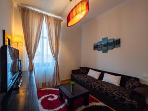 TV a/nebo společenská místnost v ubytování Mistic Apartament