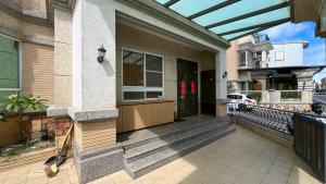 a front porch of a house with awning at 山曉 Shan Dawn l 可包棟 l 包棟請訂villa房型 l 寵物友善 in Taitung City