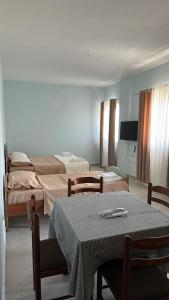 Ένα ή περισσότερα κρεβάτια σε δωμάτιο στο Armela Guest House