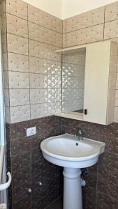 Ένα μπάνιο στο Armela Guest House