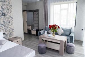 Postel nebo postele na pokoji v ubytování Max Hotel