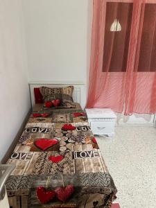 Postel nebo postele na pokoji v ubytování Résidence Zohra + 5 fotografií