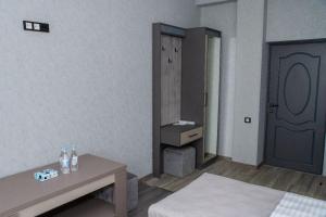 Postel nebo postele na pokoji v ubytování Max Hotel