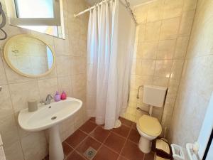 Bagno di Shkreli Apartments