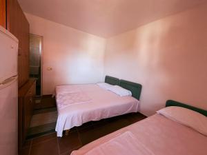 Letto o letti in una camera di Shkreli Apartments