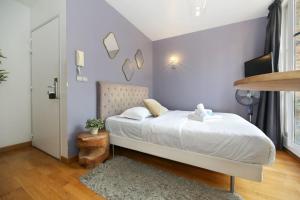Postel nebo postele na pokoji v ubytování 404 - Petit bijou dans immeuble hôtelier Paris 5 - FLAT-GUEST