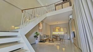 Istumisnurk majutusasutuses The Allure Villas Managed by Sahid