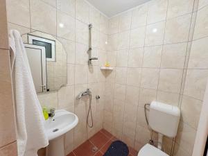 Bagno di Shkreli Apartments