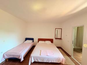 Letto o letti in una camera di Shkreli Apartments