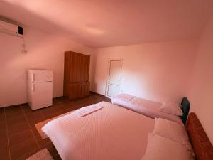 Letto o letti in una camera di Shkreli Apartments