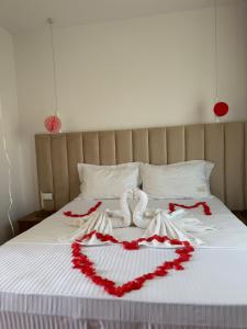 Postel nebo postele na pokoji v ubytování Hotel Vila AARON