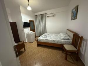 Voodi või voodid majutusasutuse Hotel Rixhi toas