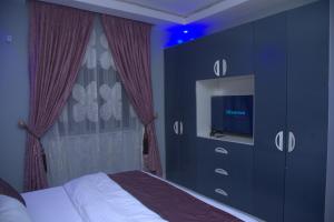 Postel nebo postele na pokoji v ubytování Kingston Luxury Apartments