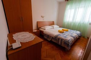 Posteľ alebo postele v izbe v ubytovaní Apartman Boris
