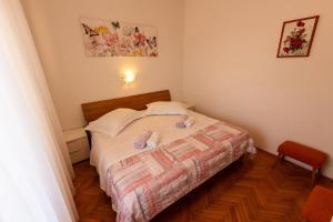 Posteľ alebo postele v izbe v ubytovaní Apartman Boris