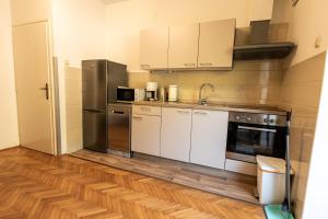 Kuchyňa alebo kuchynka v ubytovaní Apartman Boris