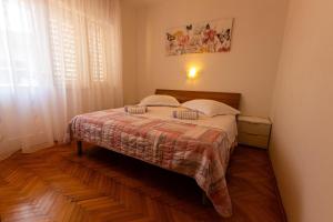 Posteľ alebo postele v izbe v ubytovaní Apartman Boris