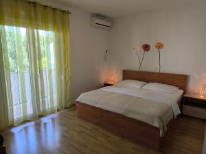 Ένα ή περισσότερα κρεβάτια σε δωμάτιο στο Haus Sabina