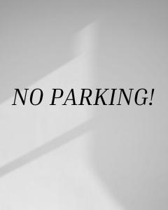 a sign that says no parking with the words no parking at Santuaria Hollywood in Hollywood