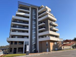 a building with balconies on the side of a street at B&B Diamante in Chieti