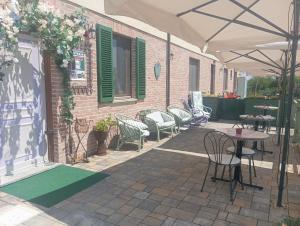 Patio alebo iná vonkajšia časť ubytovania CASCINA LAI - Oasi Naturalistica - Camere private + 9 fotografií