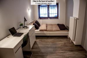 Postel nebo postele na pokoji v ubytování 4 Rooms