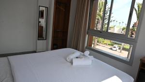 Postel nebo postele na pokoji v ubytování Hotel Centre Ville