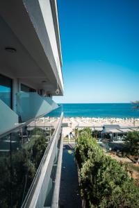 a view of the beach from the balcony of a hotel at miami costinesti in Costinesti