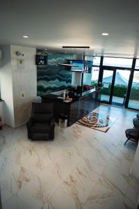 a living room with a couch and a table at miami costinesti in Costinesti +97 photos