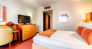 TV a/nebo společenská místnost v ubytování The Q - Quadro City Hotel