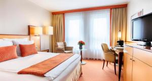 Postel nebo postele na pokoji v ubytování The Q - Quadro City Hotel