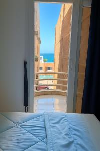 Ένα ή περισσότερα κρεβάτια σε δωμάτιο στο Majestic apartments