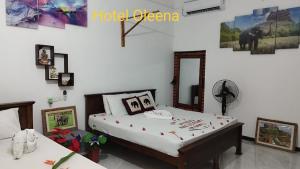 Postel nebo postele na pokoji v ubytování Oleena Home Stay