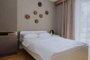 Posteľ alebo postele v izbe v ubytovaní DivciCasa apartments Divčibare