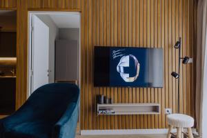Televízia a/alebo spoločenská miestnosť v ubytovaní DivciCasa apartments Divčibare