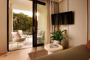 TV a/nebo společenská místnost v ubytování Arba Resort, Valamar Collection