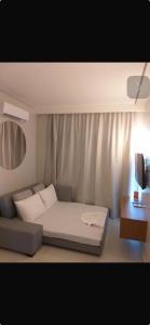 Giường trong phòng chung tại Salinas Exclusive Resort