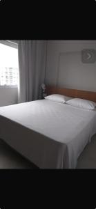 Giường trong phòng chung tại Salinas Exclusive Resort