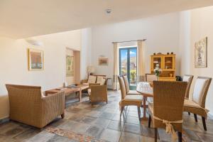 Fotografija u galeriji objekta Le Residenze In Piazza u gradu Boza