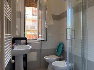 Koupelna v ubytování La Casa Delle Stelle Cadenti + 14 fotografií