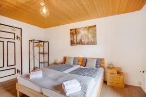 Postel nebo postele na pokoji v ubytování Die Bäckeralm