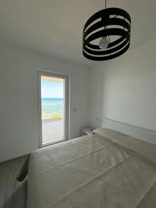 Postel nebo postele na pokoji v ubytování La Bella Vista