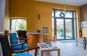 Posezení v ubytování LOGIS-Hôtel-Restaurant La Gentilhommière