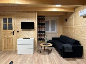 TV a/nebo společenská místnost v ubytování Letni Vibe + 4 fotografie