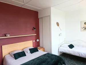 Postel nebo postele na pokoji v ubytování GITE LA NOTARIALE